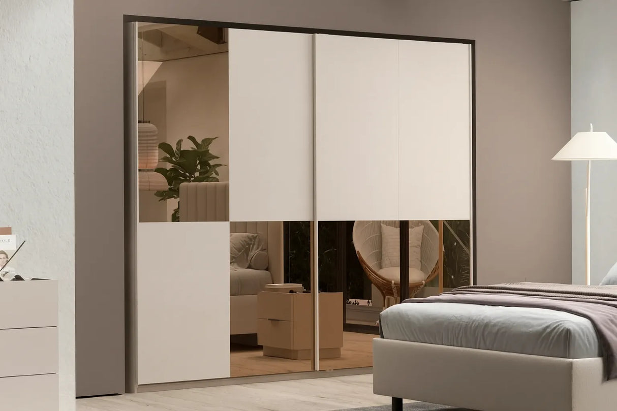 Camera da letto moderna Milano con letto contenitore, armadio scorrevole cashmere con specchi bronzati, comò e comodini