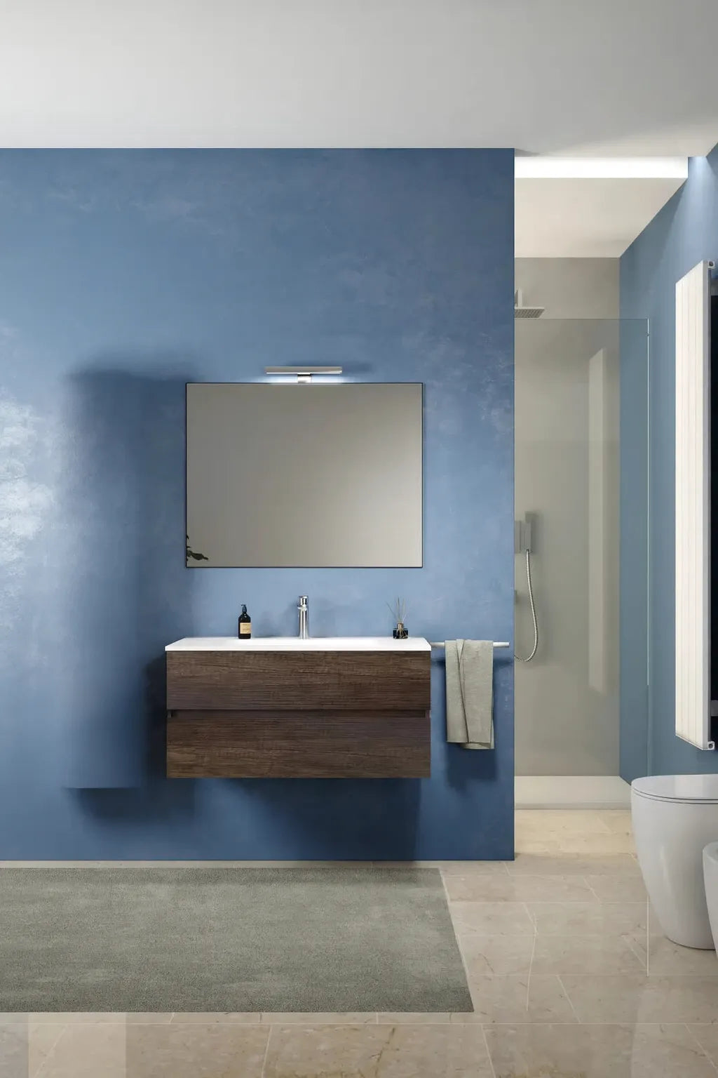 Composizione bagno sospesa modello Ester con lavabo in ceramica, specchio con faretto e cassetti laminati Lux in stile moderno.