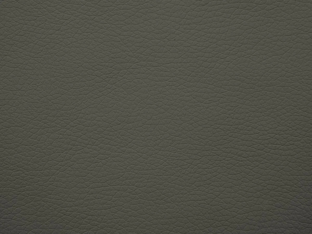 Letto singolo Rio con contenitore in ecopelle, testata trapuntata a rombi e piedini alti. Ideale per spazi moderni e camere eleganti.