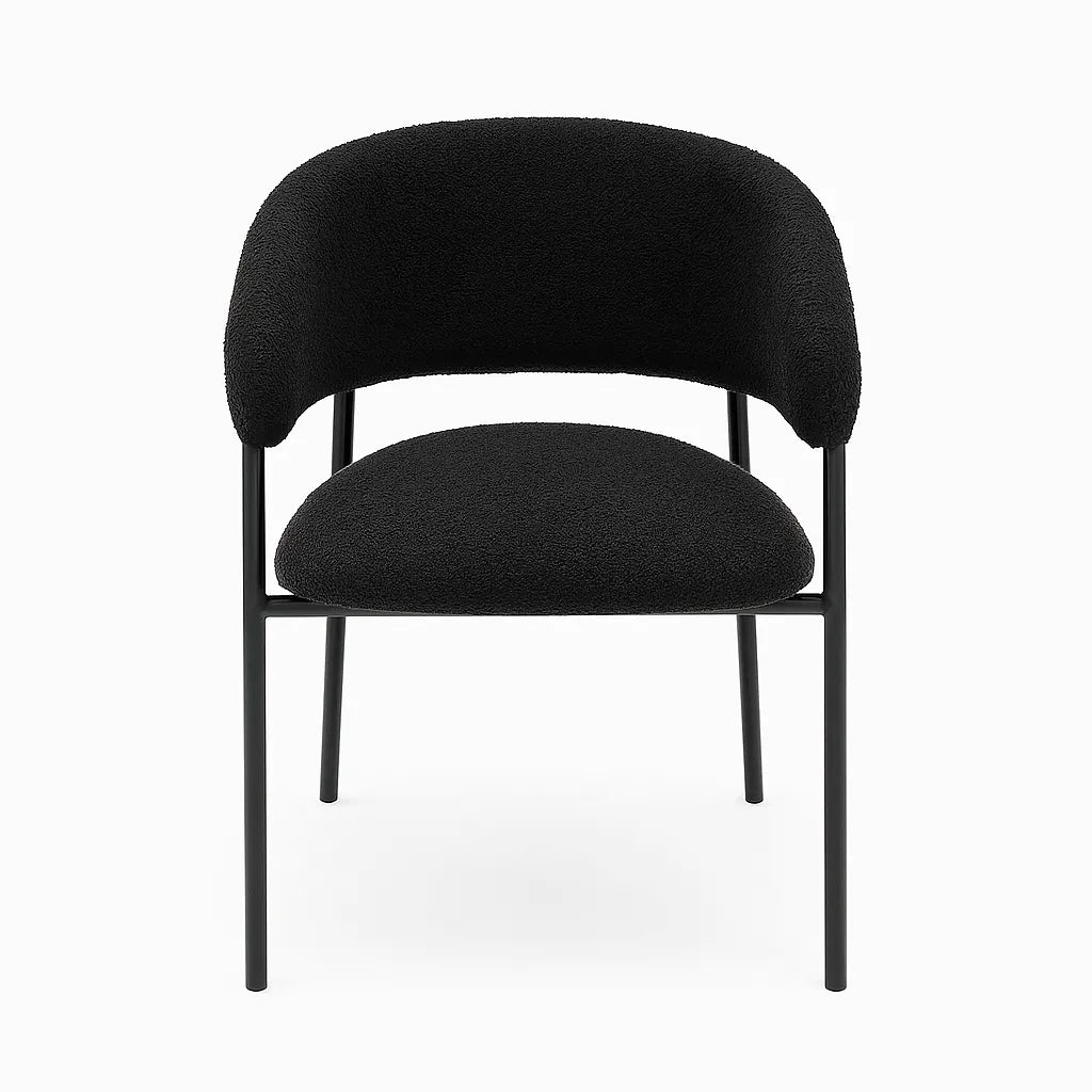 Poltrona Megan in tessuto bouclé con gambe nere moderne e seduta imbottita