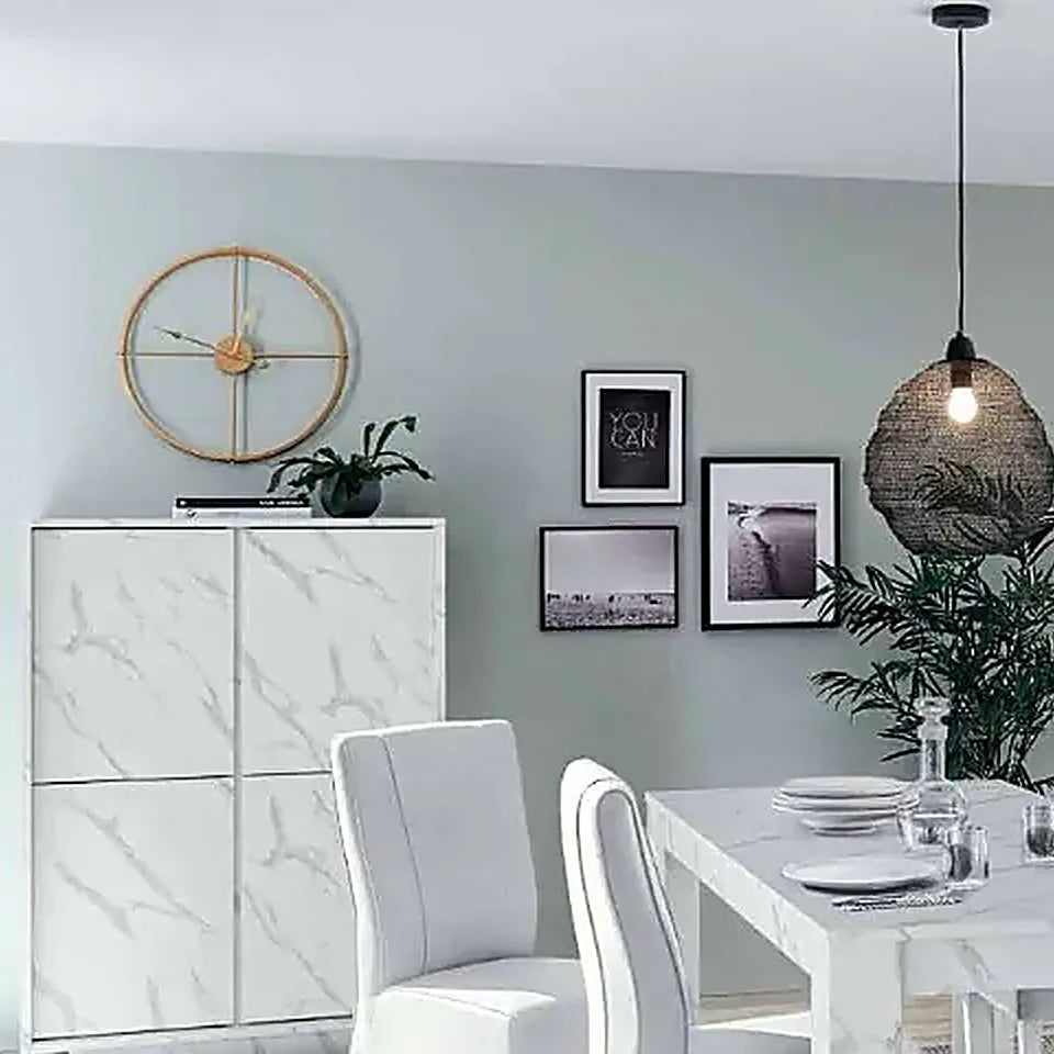 Sala Greta soggiorno moderno effetto marmo bianco.