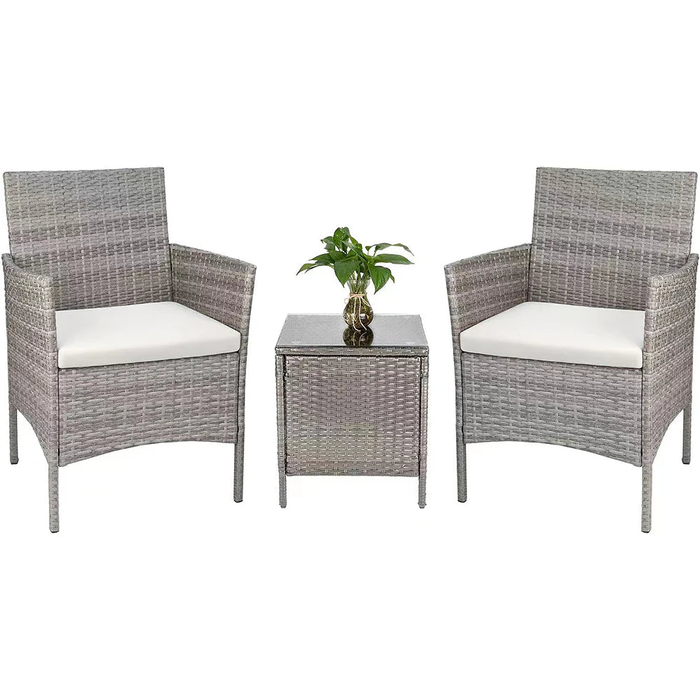 Set da giardino in rattan grigio con due poltrone e tavolino in vetro temperato con cuscini beige
