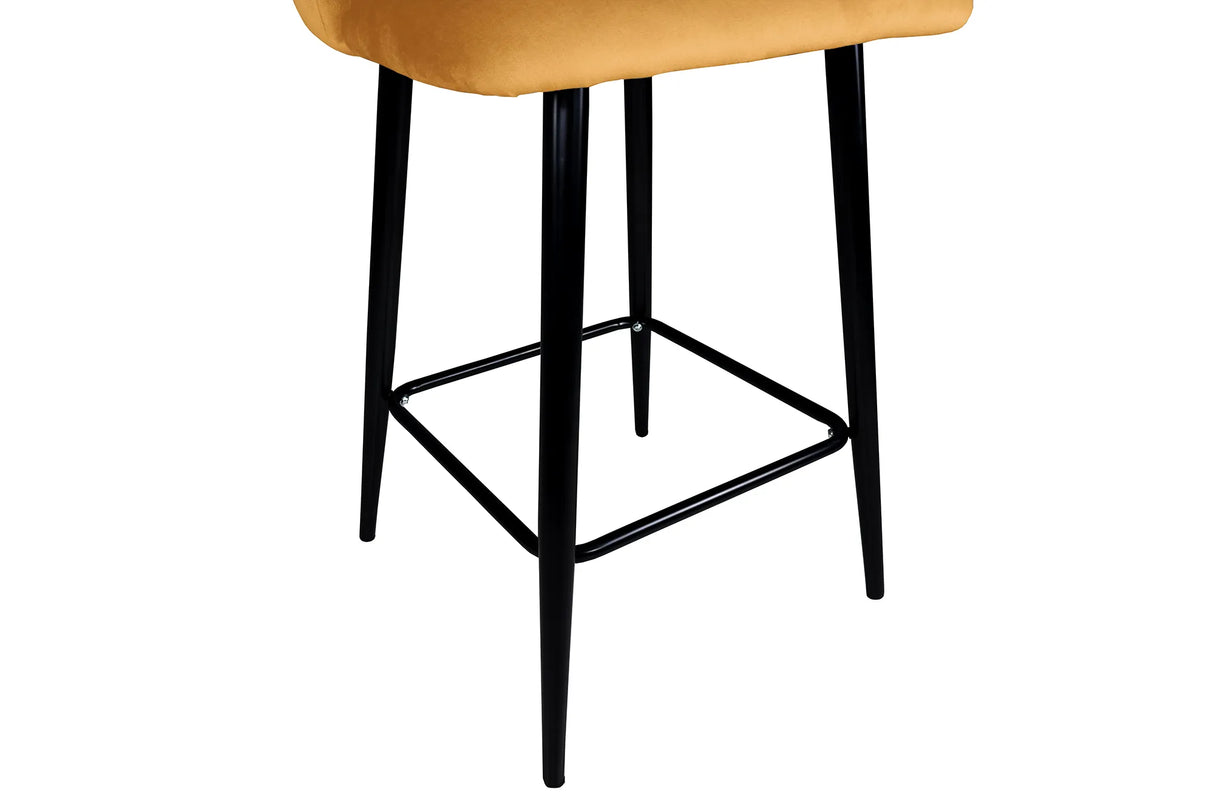 Sgabello Mary in velluto disponibile nei colori tortora, grigio e senape con struttura e poggiapiedi in metallo