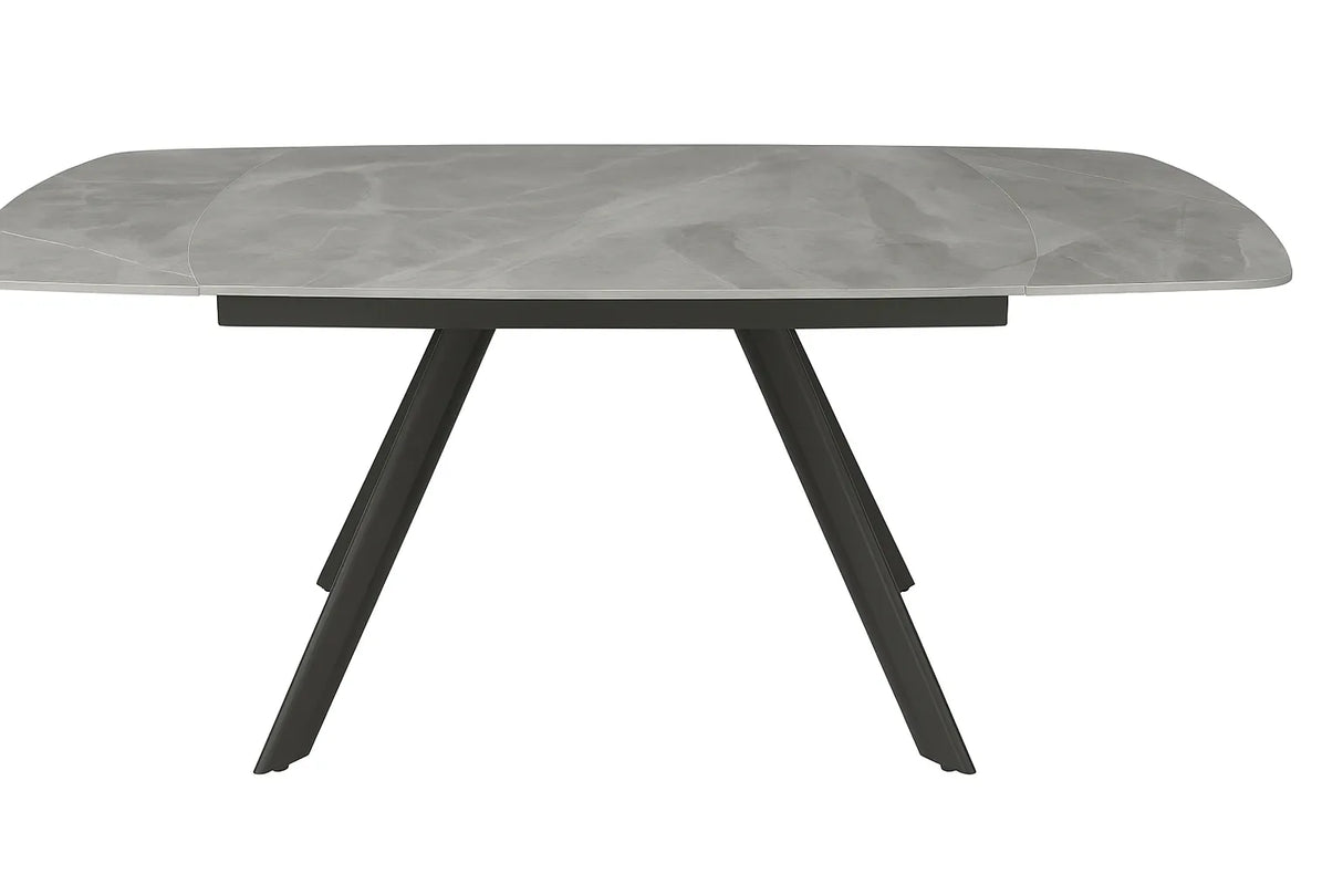 Tavolo allungabile rotante in ceramica effetto marmo nero con gambe in metallo, da 6 a 8 posti.