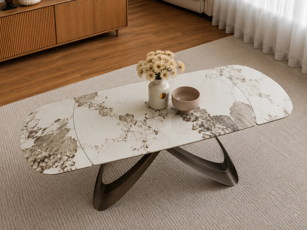 Tavolo Fly allungabile da 160 a 240 cm con piano in ceramica e base in metallo verniciato. Disponibile in due varianti di colore