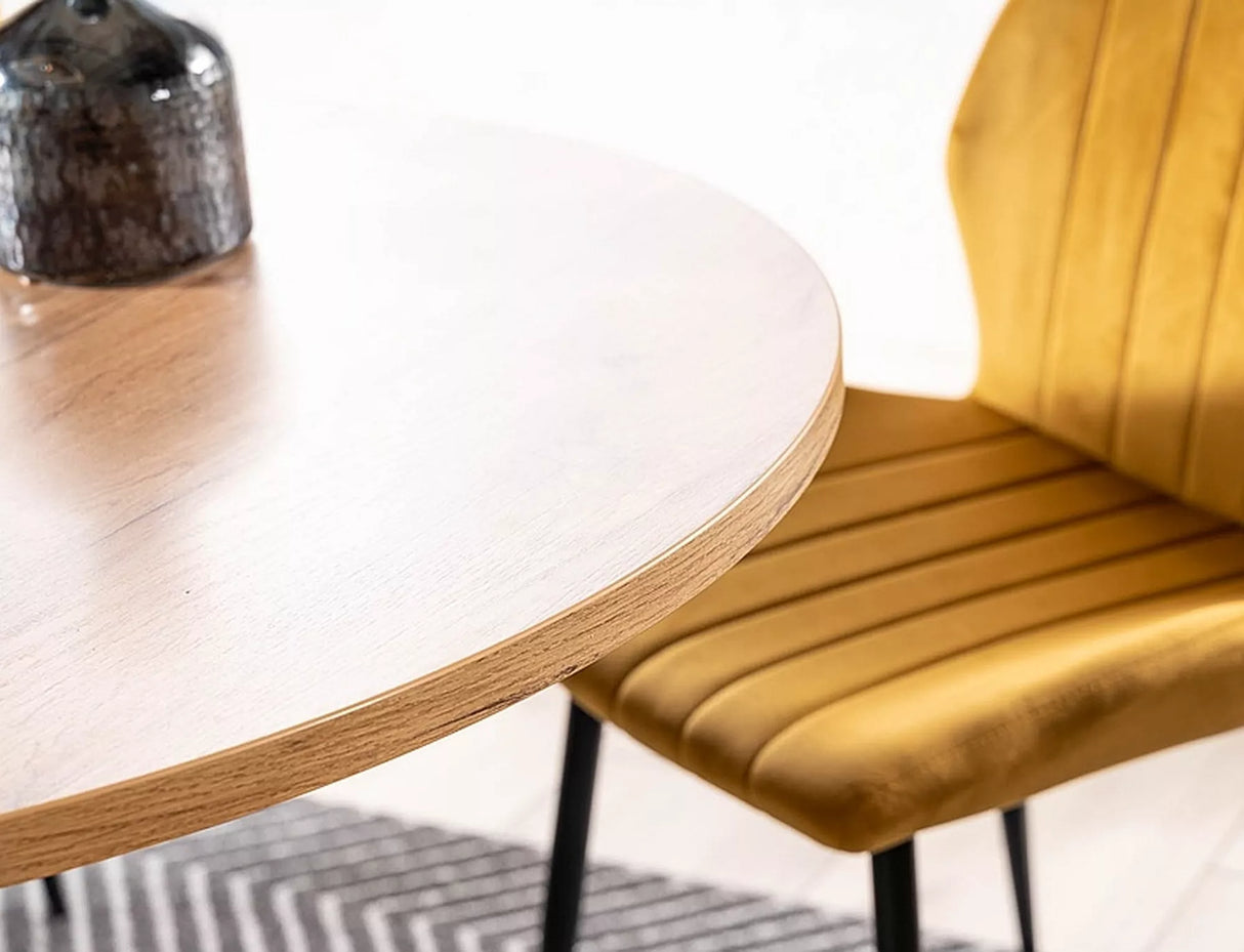 Tavolo allungabile Gaston con piano effetto rovere artigianale e gambe in metallo nero