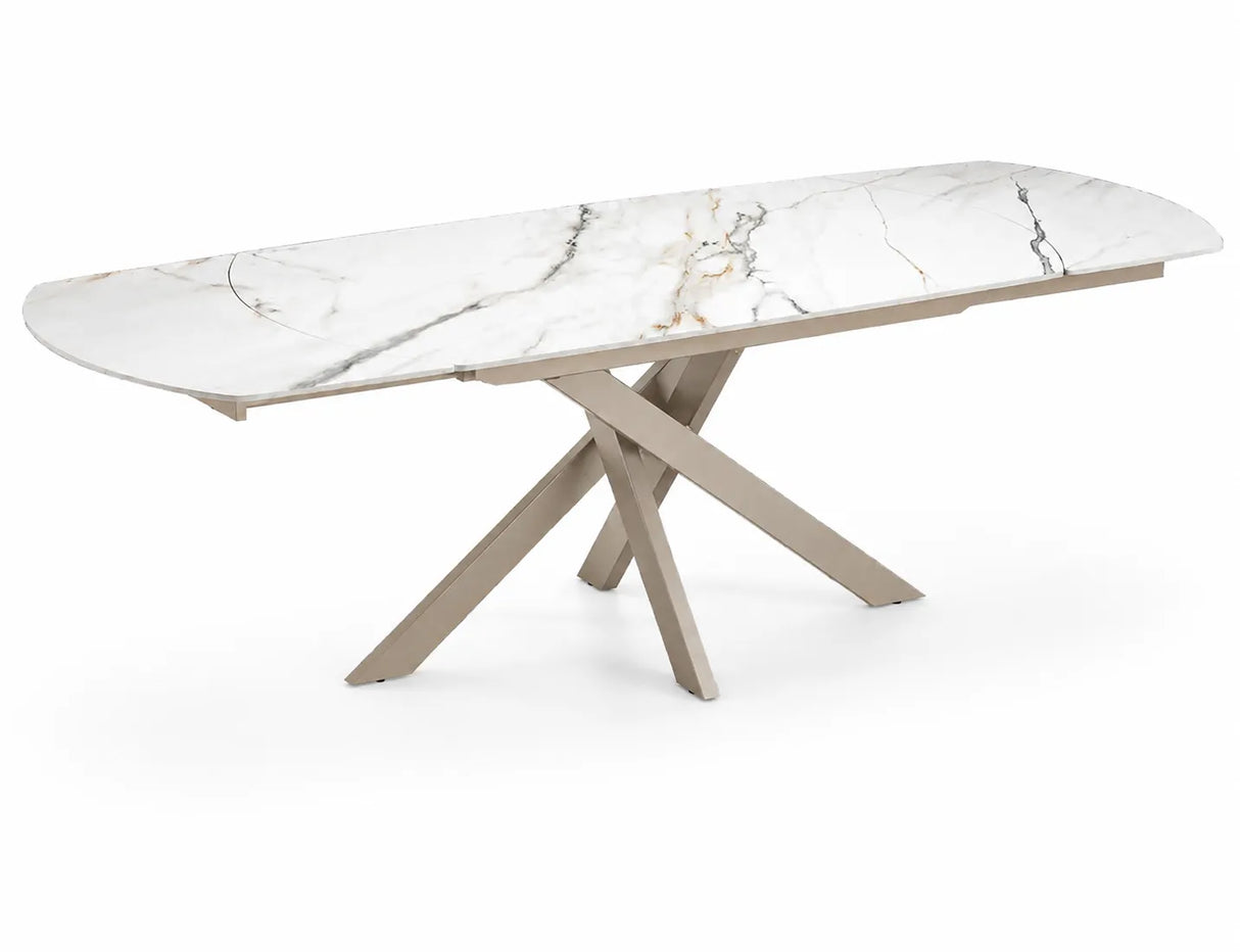 Tavolo allungabile Giove 140/200 cm con piano in ceramica effetto Marmo Oro Opaco e struttura in metallo Champagne.