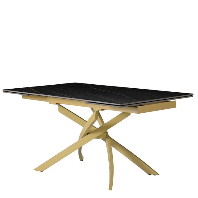 Tavolo Pegaso allungabile in ceramica con gambe incrociate in metallo, design elegante per soggiorno o cucina