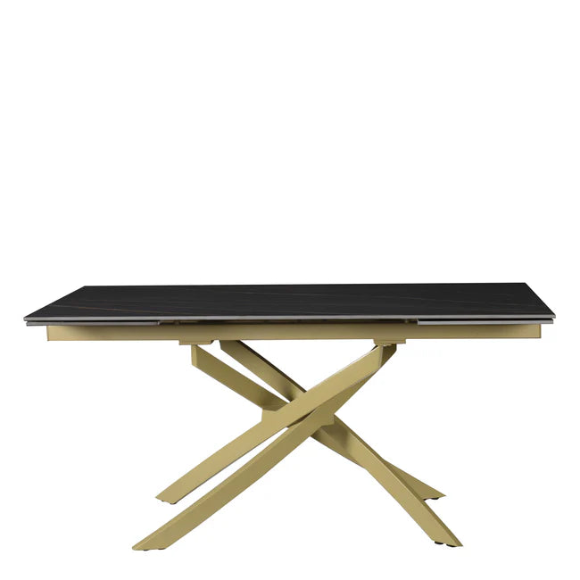 Tavolo Pegaso allungabile in ceramica con gambe incrociate in metallo, design elegante per soggiorno o cucina