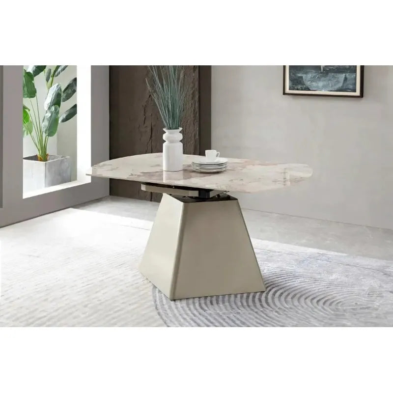 Tavolo allungabile Zeus con piano in marmo e struttura in metallo champagne o nero