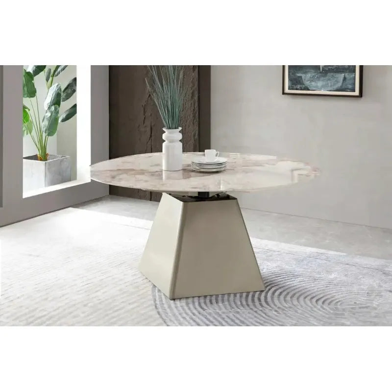 Tavolo allungabile Zeus con piano in marmo e struttura in metallo champagne o nero