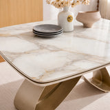 Tavolo da pranzo allungabile con piano in ceramica effetto marmo e base in metallo colore bronzo o oro