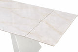 Tavolo Alex allungabile con top in gres porcellanato effetto marmo Calacatta e gambe in metallo bianco