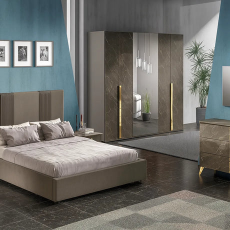 Camera da letto moderna Edimburgo con letto contenitore e finiture marmo scuro e oro