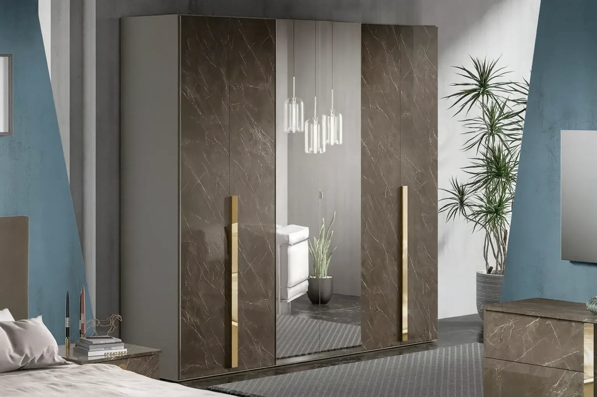 Camera da letto moderna Edimburgo con letto contenitore e finiture marmo scuro e oro