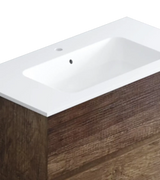 Composizione bagno sospesa modello Ester con lavabo in ceramica, specchio con faretto e cassetti laminati Lux in stile moderno.