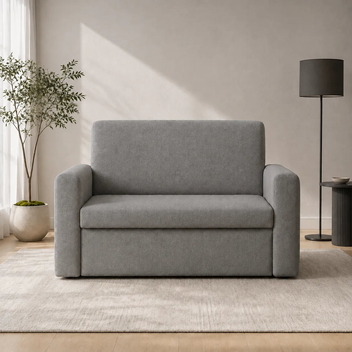 Divanetto salvaspazio 2 posti da 120 cm in tessuto. Disponibile beige, grigio chiaro e grigio scuro.