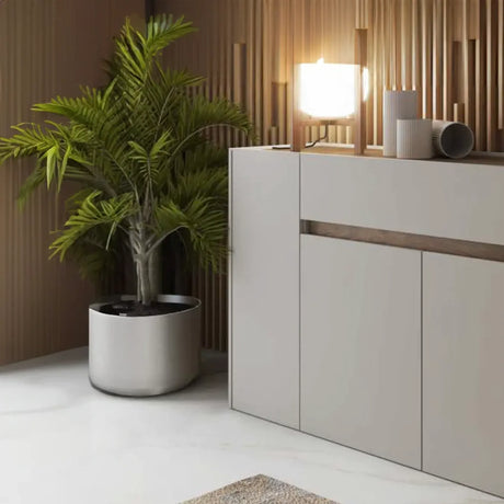 Madia Jade finitura cachemire e mercure con ante e vano centrale.