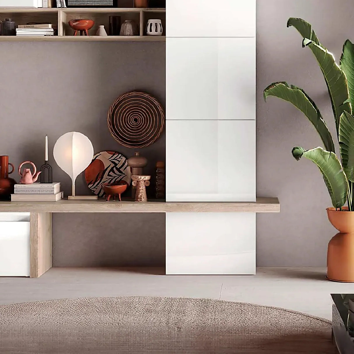 Parete attrezzata Nora finitura bianco lucido e Kadiz con base porta TV e pensili.