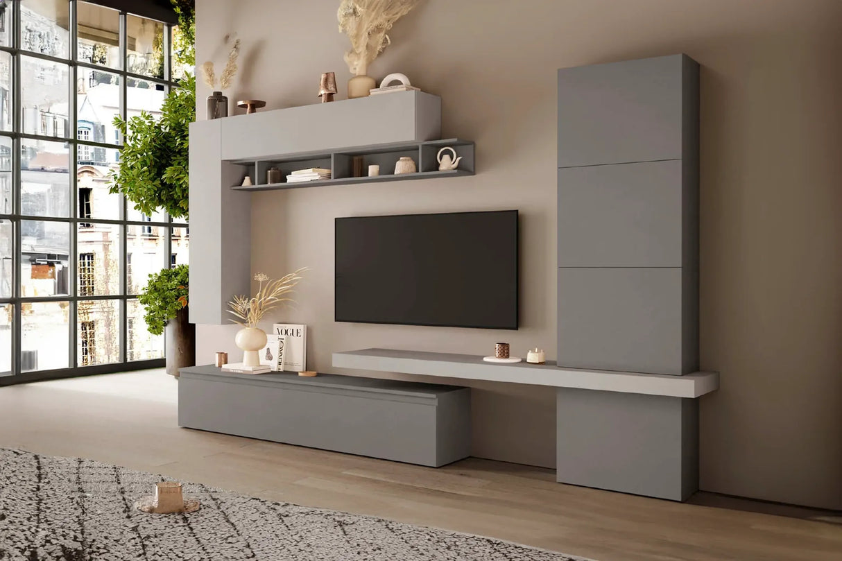 Parete attrezzata Zoe finitura grigio ardesia e gesso con base porta TV e pensili.