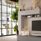 Parete attrezzata Zoe finitura grigio ardesia e gesso con base porta TV e pensili.