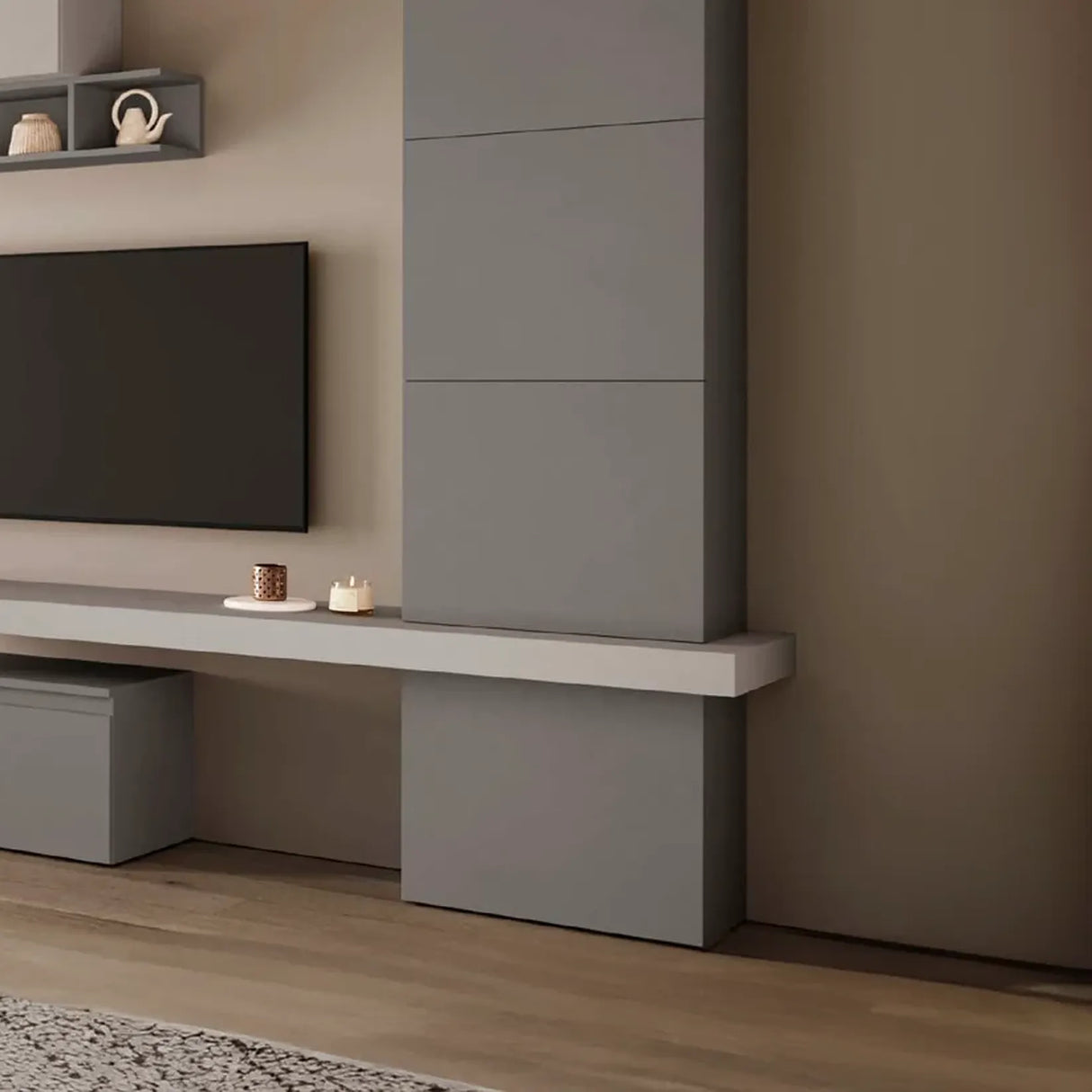 Parete attrezzata Zoe finitura grigio ardesia e gesso con base porta TV e pensili.