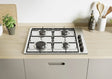 Piano cottura a gas Candy CHW6LBX da incasso, 4 fuochi in acciaio inox con griglie in metallo e valvola di sicurezza, design moderno e compatto.