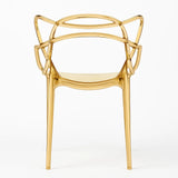 Sedia Curve in polipropilene trasparente color oro con design moderno e linee intrecciate