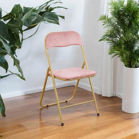 Sedia pieghevole Cinzia in velluto rosa con gambe in metallo oro, elegante e salvaspazio
