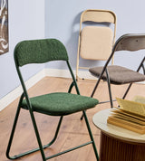 Sedia pieghevole Solana in tessuto bouclè con struttura in metallo, design moderno e salvaspazio
