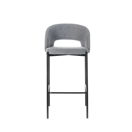 Sgabello Greta in tessuto grigio con schienale imbottito e gambe in metallo nero, ideale per penisola e cucina moderna