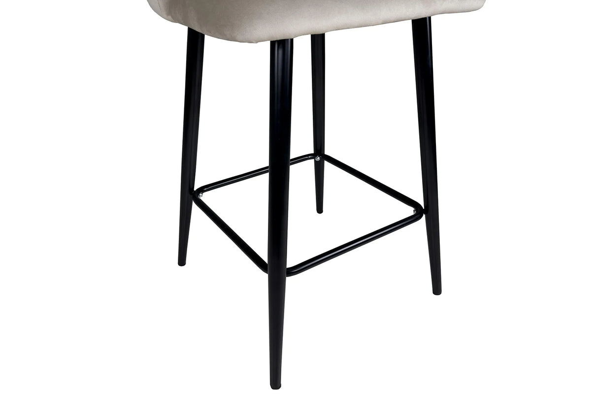 Sgabello Mary in velluto disponibile nei colori tortora, grigio e senape con struttura e poggiapiedi in metallo