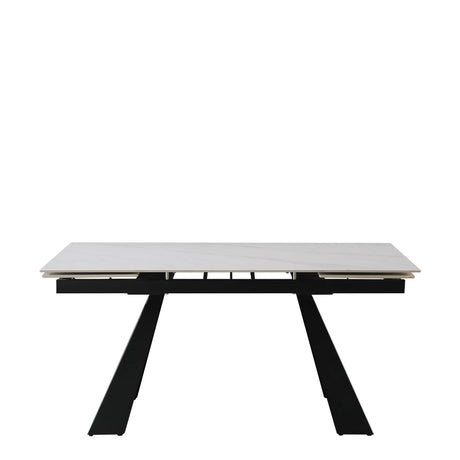 Tavolo Alex allungabile con top in gres porcellanato effetto marmo Calacatta e gambe in metallo nero