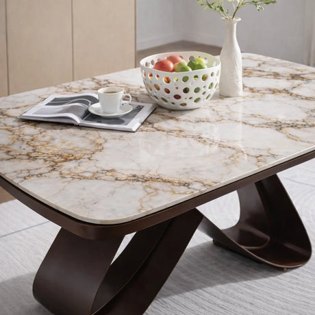 Tavolo da pranzo allungabile con piano in ceramica effetto marmo e base in metallo colore bronzo o oro