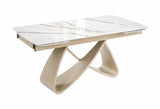 Tavolo allungabile Eros con piano in ceramica effetto marmo oro lucido e struttura in metallo color Champagne da 180 a 260 cm.