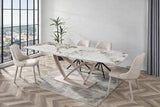 Tavolo Angel 160 cm allungabile a 240 cm, con piano in ceramica effetto marmo calacatta e struttura cashmere.