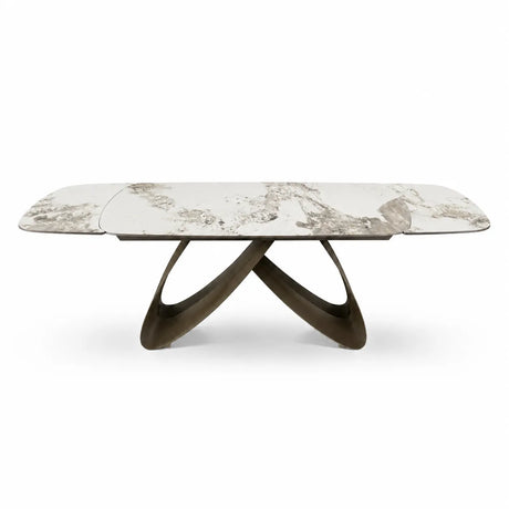 Tavolo Fly allungabile da 160 a 240 cm con piano in ceramica e base in metallo verniciato. Disponibile in due varianti di colore