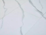 Tavolo allungabile Gaston con piano effetto rovere artigianale e gambe in metallo nero