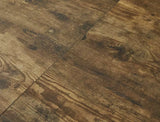 Tavolo allungabile Gaston con piano effetto rovere artigianale e gambe in metallo nero

