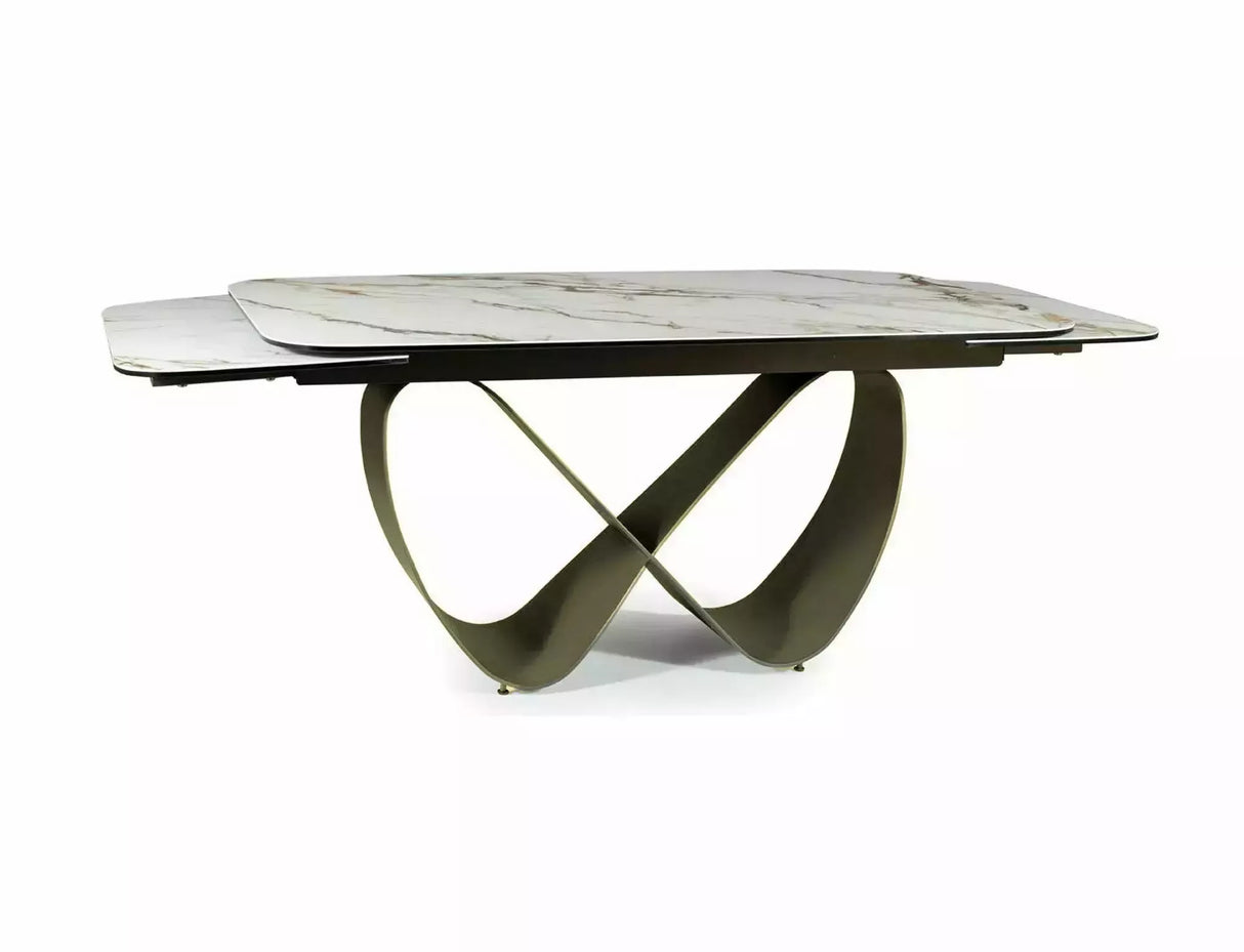 Tavolo Infinity Ceramic allungabile con top in vetroceramica marmo bianco e struttura in metallo oro opaco

