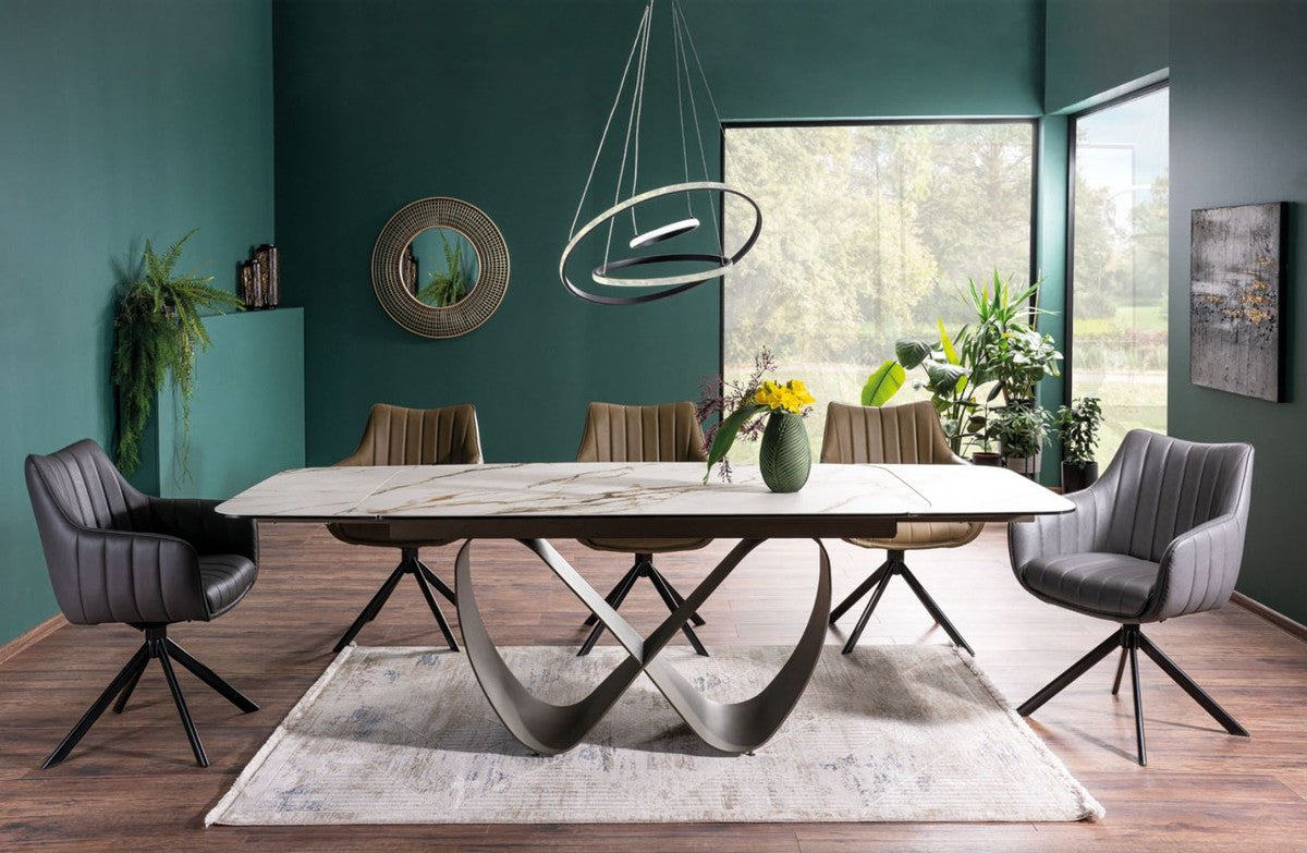 Tavolo Infinity Ceramic allungabile con top in vetroceramica marmo bianco e struttura in metallo oro opaco

