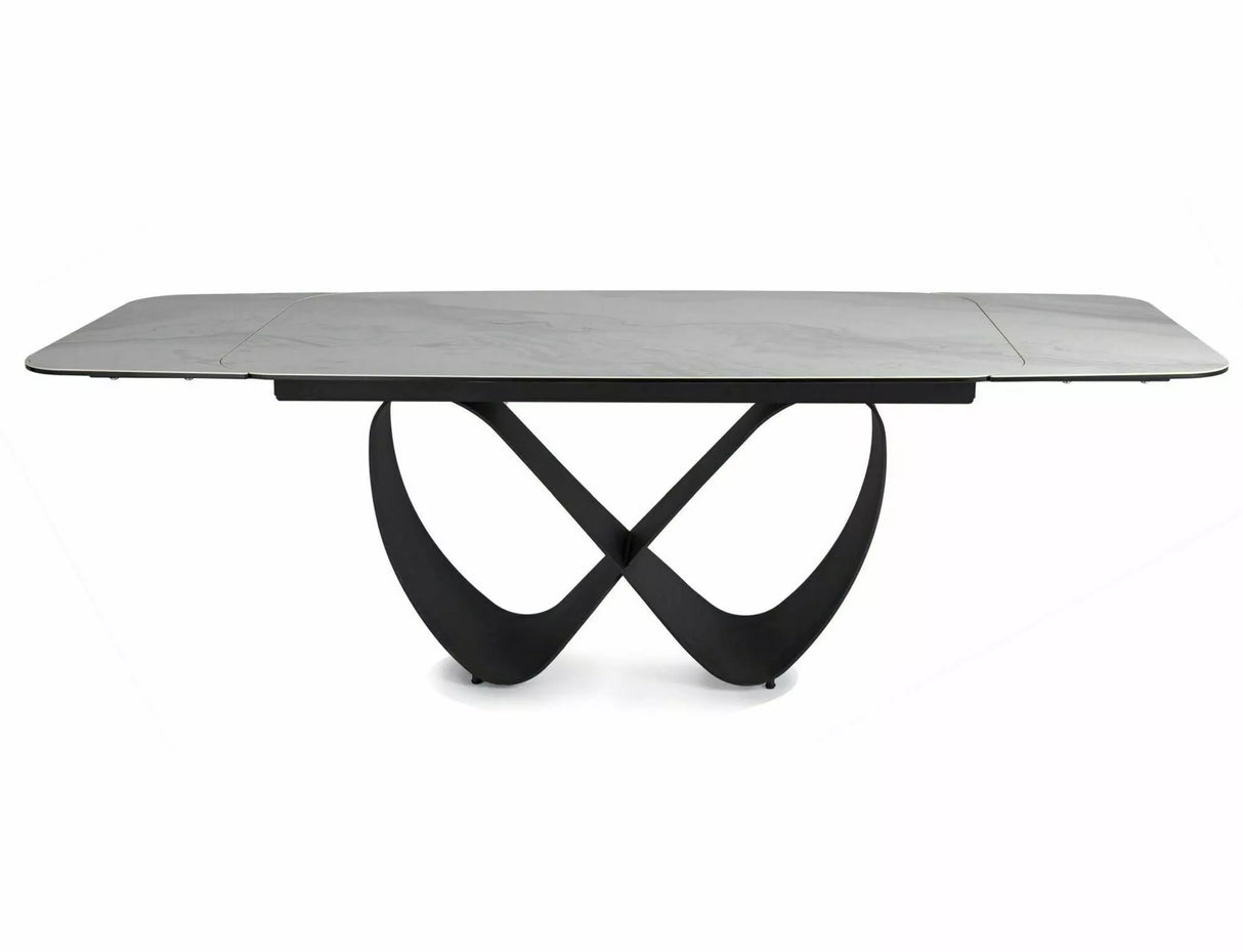 Tavolo Infinity Ceramic allungabile con top in vetroceramica effetto marmo bianco e struttura in metallo nero

