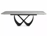 Tavolo Infinity Ceramic allungabile con top in vetroceramica effetto marmo bianco e struttura in metallo nero

