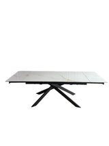 Tavolo Luna allungabile con piano in ceramica effetto marmo Calacatta Oro e base in metallo oro o nero