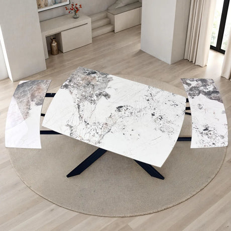 Tavolo Mykonos ovale allungabile con piano in ceramica effetto marmo Onice lucido e basamento nero