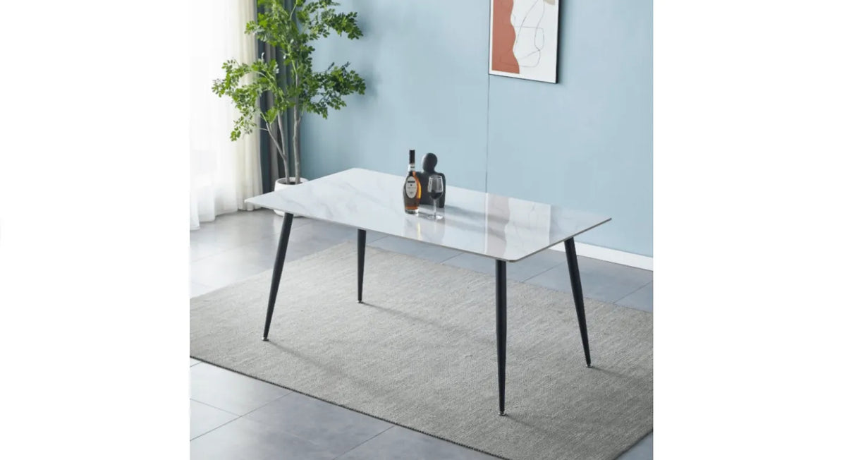 Tavolo da pranzo rettangolare con piano in ceramica marmo bianco e gambe in metallo nero

