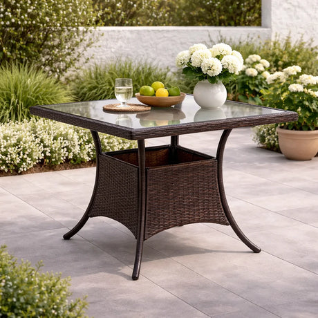 Tavolo Lory quadrato 80x80 cm in rattan intrecciato con piano in vetro temperato per esterni