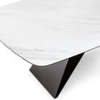 Tavolo Thanos X allungabile con piano in ceramica effetto marmo Calacatta Oro e struttura in metallo bronzo