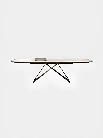Tavolo Thanos X allungabile con piano in ceramica effetto marmo Calacatta Oro e struttura in metallo bronzo

